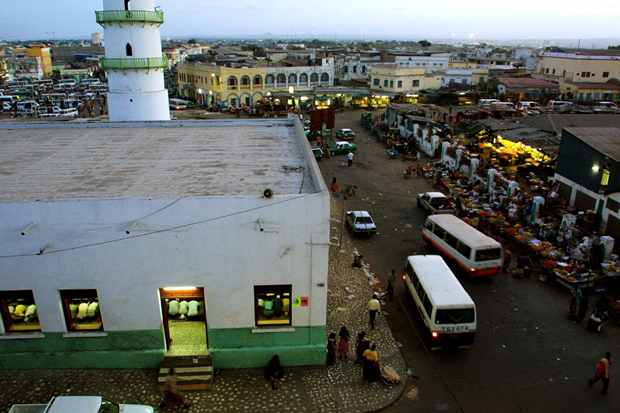 DJIBOUTI TOWN, DJIBOUTI - FEBRUARY 25: Worshippers bow in a mosque during an evening service February 25, 2003 near the main fruit and vegetable market in Djibouti Town, Djibouti. The tiny, predominantly-Muslim nation of Djibouti has been catapulted to strategic and geo-political importance within the last year as both Germany and the U.S. have stationed troops there in the ongoing war against terror. (Photo by Sean Gallup/Getty Images)
