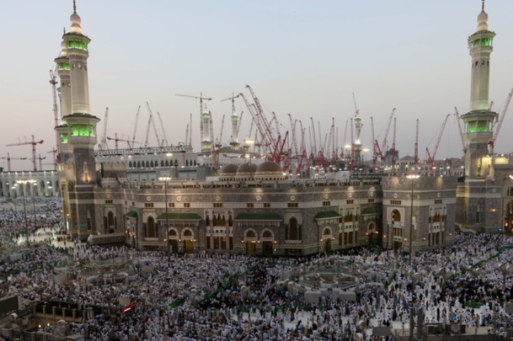Muslim pilgrims pray outside the Grand Mosque, a day before Muslim's annual pilgrimage, known as the Hajj, in the Muslim holy city of Mecca, Saudi Arabia, Wednesday, Oct. 1, 2014. (AP Photo/Khalid Mohammed)